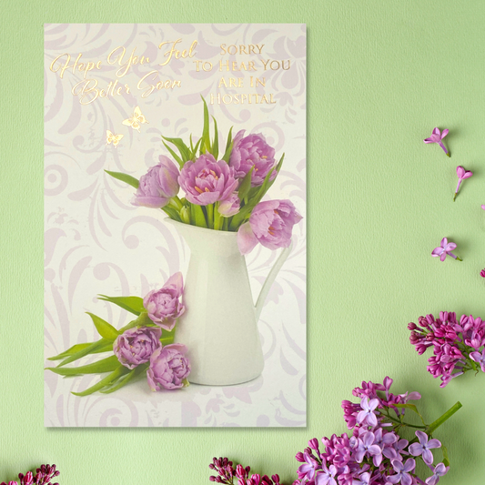 Front image with floral vase and gold foil text