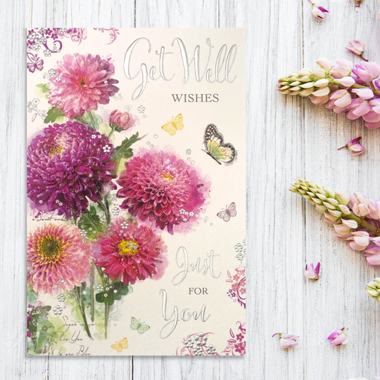 Front image with pink and purple flowers, butterflies and silver text