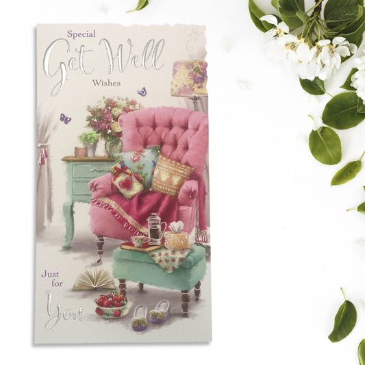 Slim card with pink armchair, blanket and footstool with coffee and strawberries