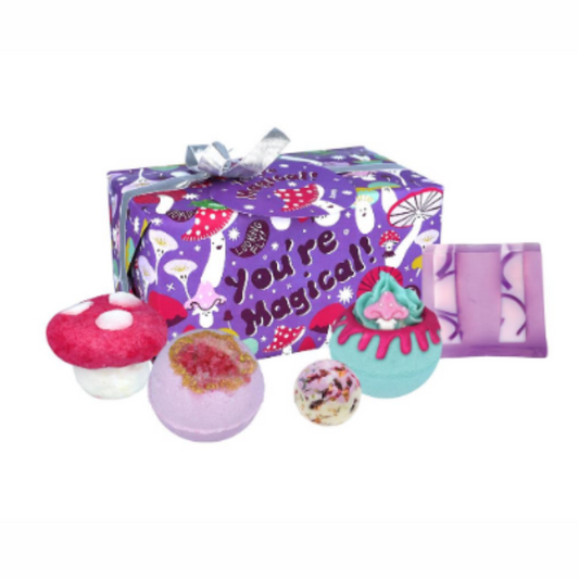 Mushroon and purple themed bath bombs wrapped in funky purple You're Magical paper with silver ribbons