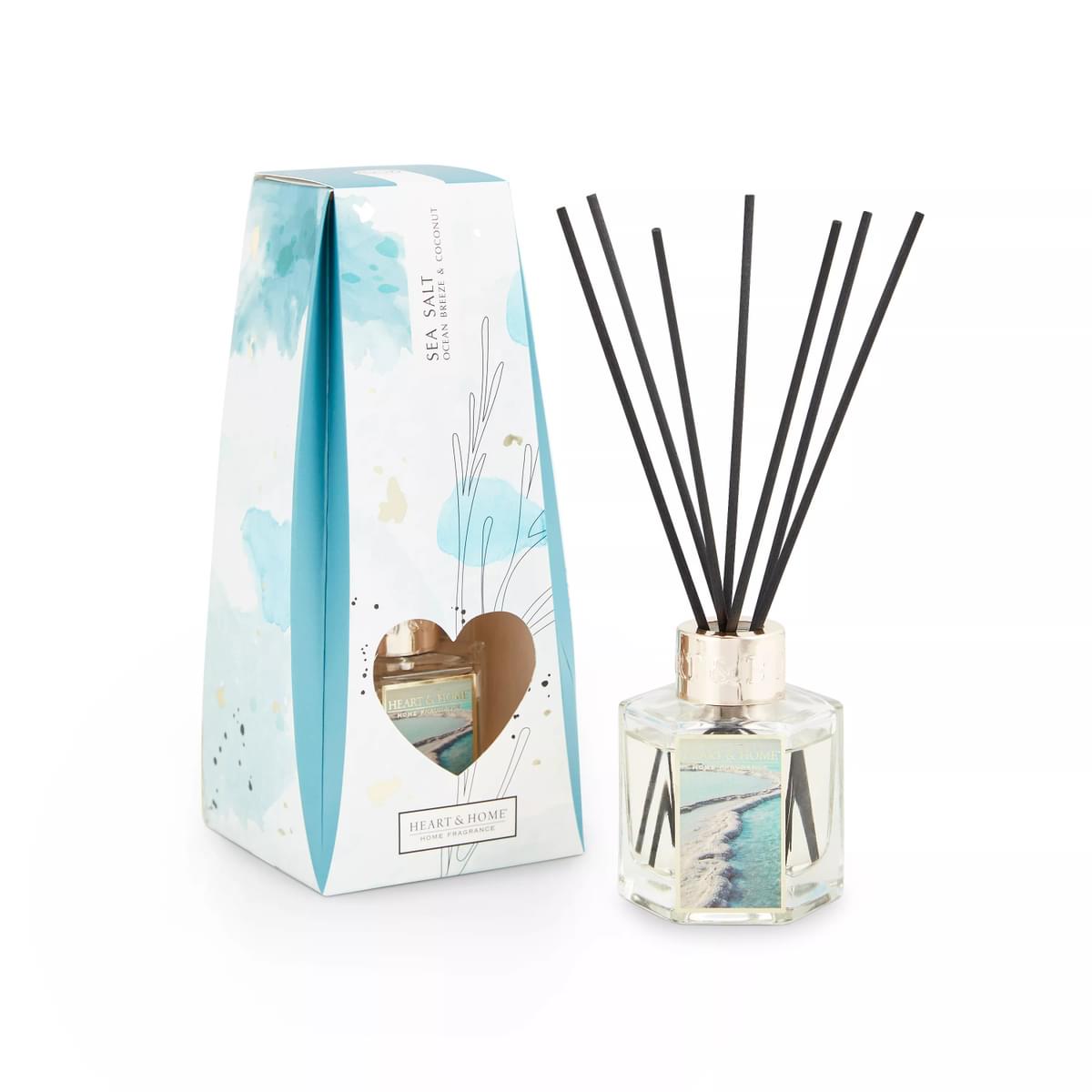 Pretty blue and white gift box with heart shape cut out to reveal reed diffuser with black reeds