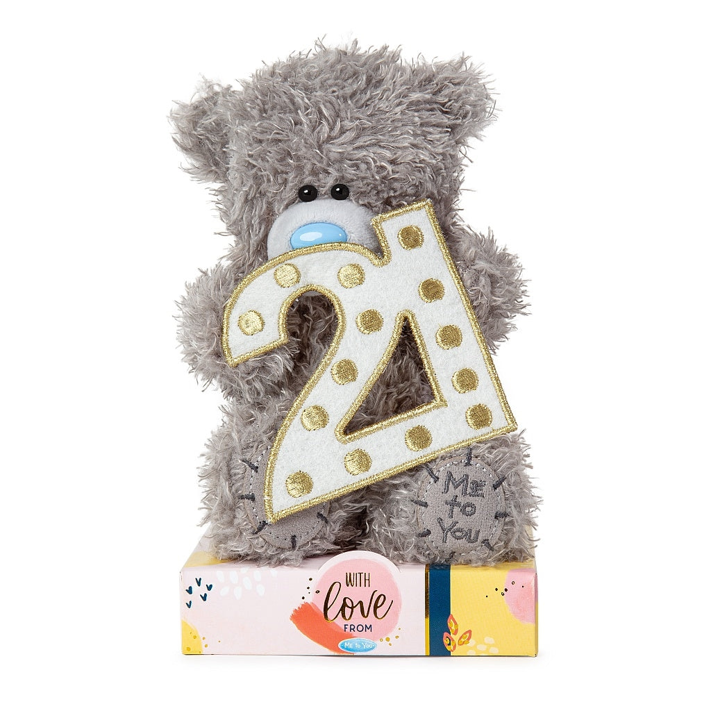 Front facing image of Tatty Teddy with base