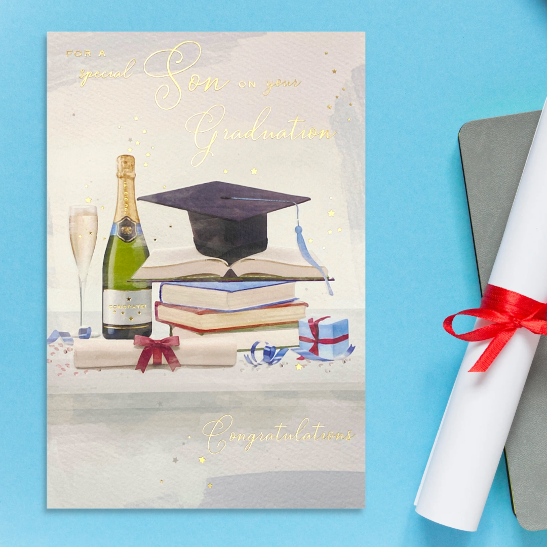 Front image showing watercolour style graduation theme card. With books, bubbly and Graduation Hat