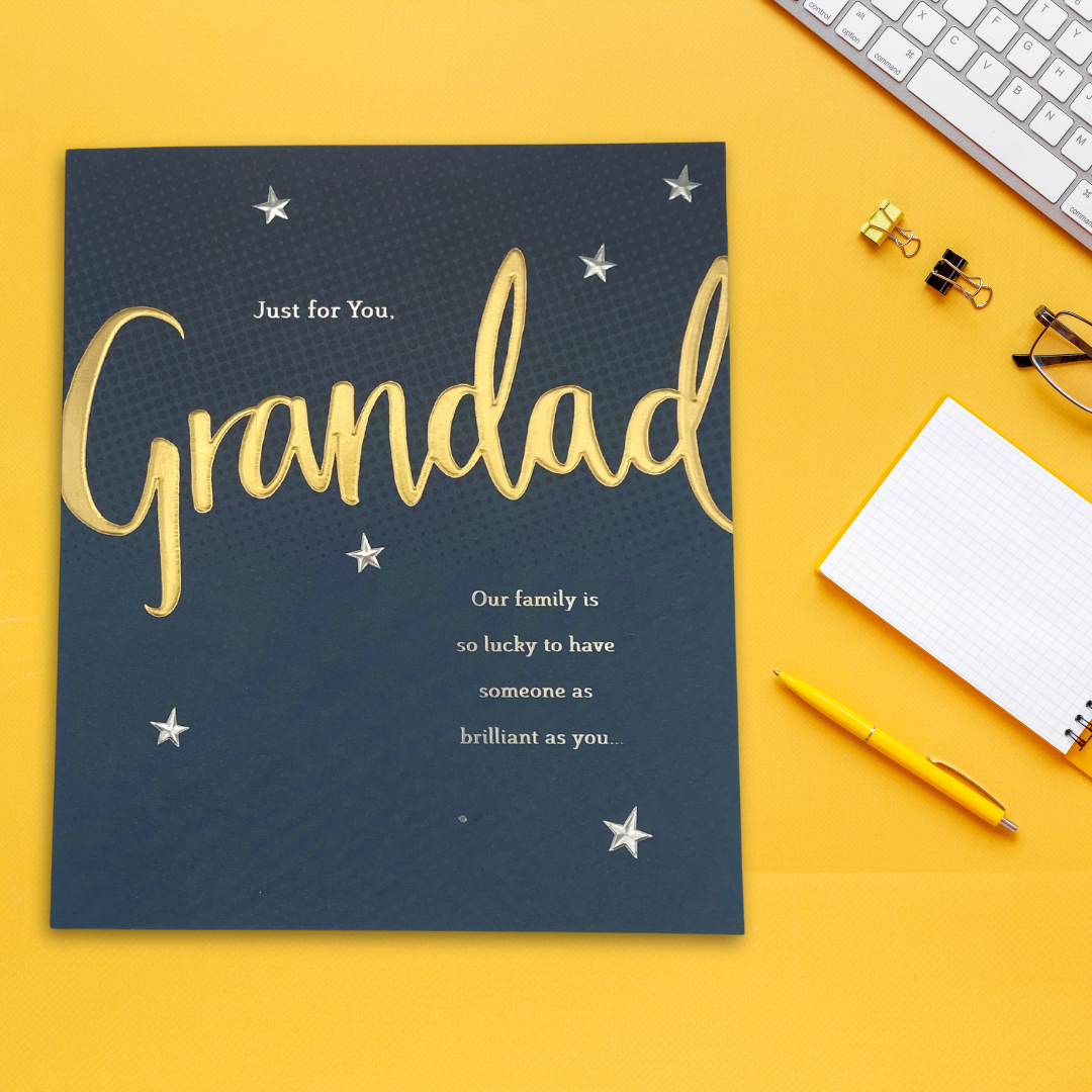 Navy square card with silver stars and gold script text