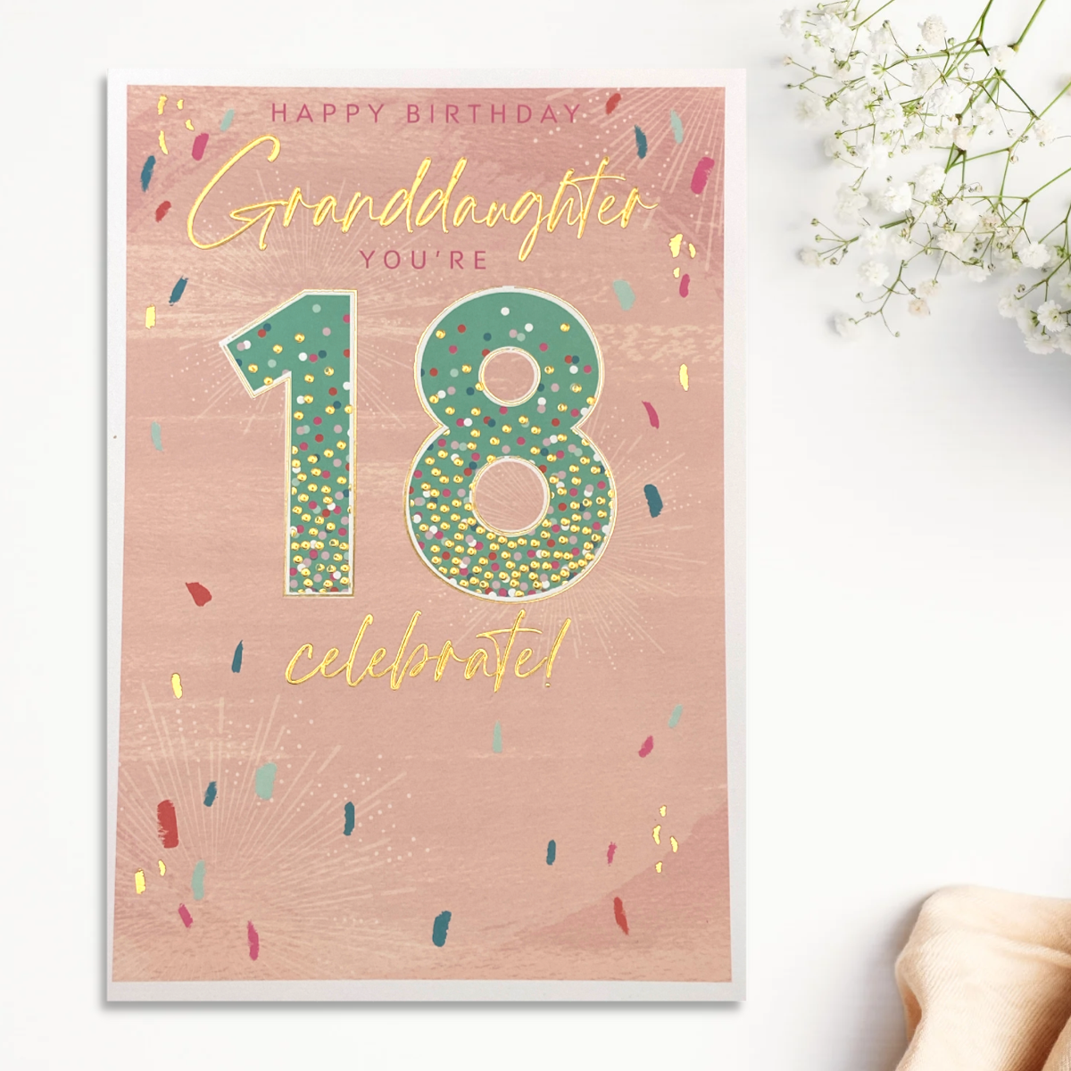 Pink theme card with confetti and green, pink and gold numbers