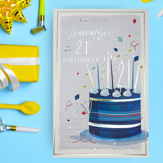 Large card with blue and silver cake and candles with silver border and text