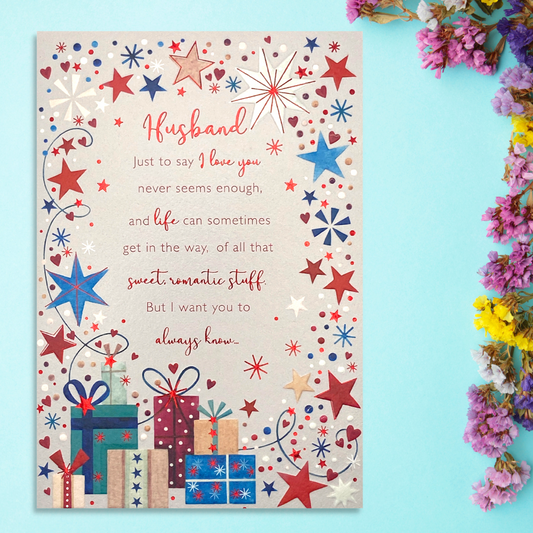 Husband card with blue and red star border, gifts and verse