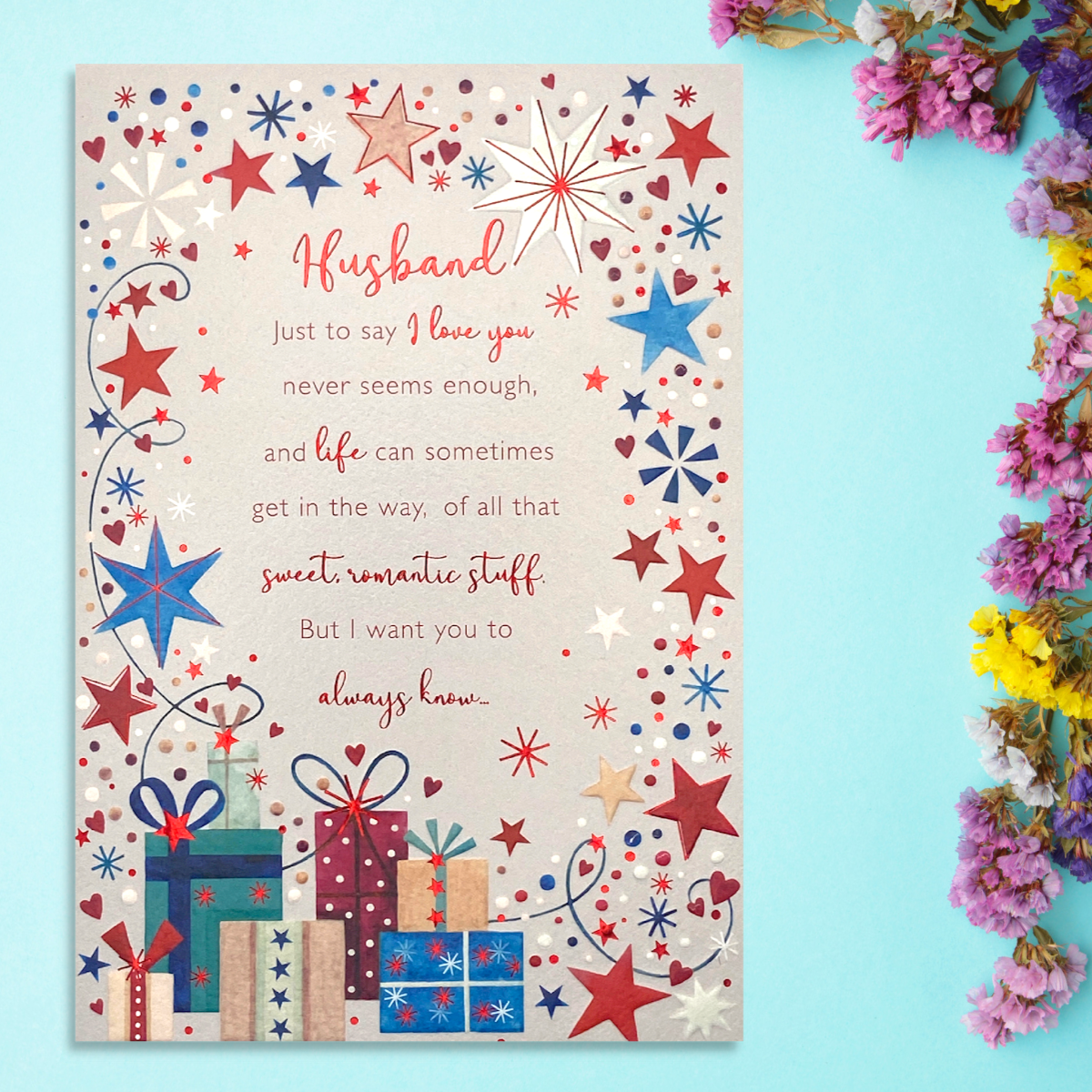 Husband card with blue and red star border, gifts and verse