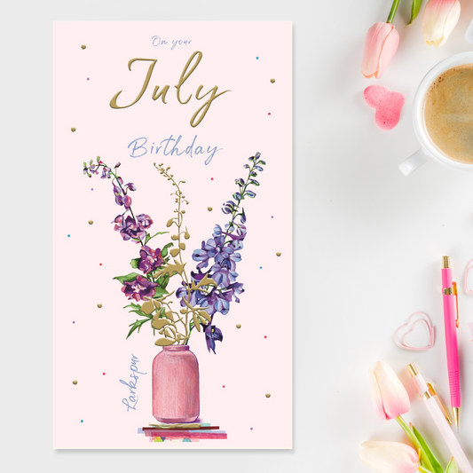 Slim pink card with vase of Larkspur flowers and gold foil text