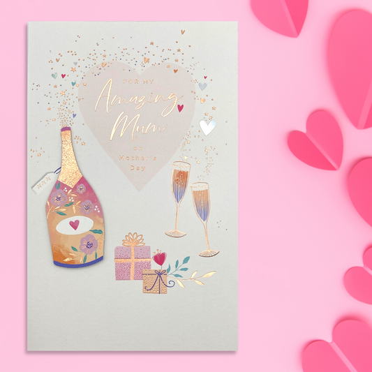 White card with pink and coral colour theme, bottle of bubbly and flutes with heart and text