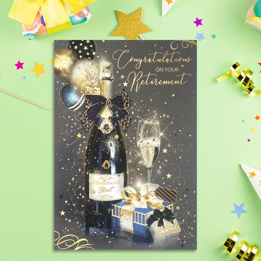 Front Image showing Bubbly, gift and balloons on dark background with gold foil details