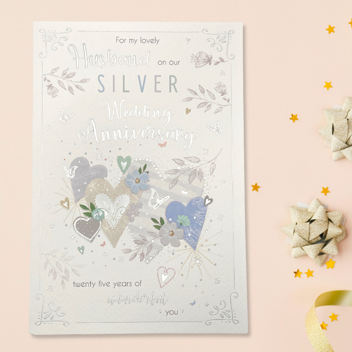 Front image of Husband silver anniversary card with multi colour hearts and butterflies