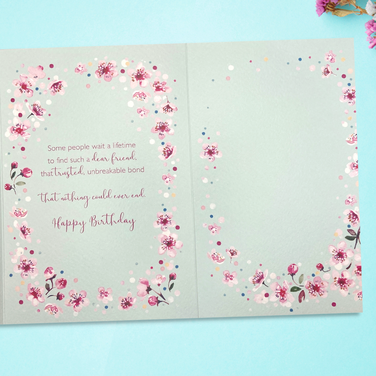 Two further pages with floral border and verse