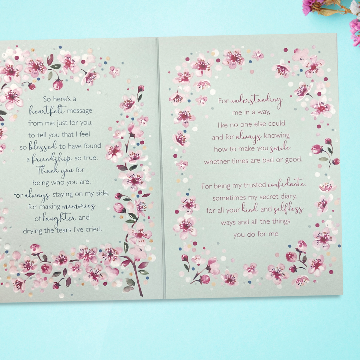 Inside image with two pages of heartfelt verse with floral border
