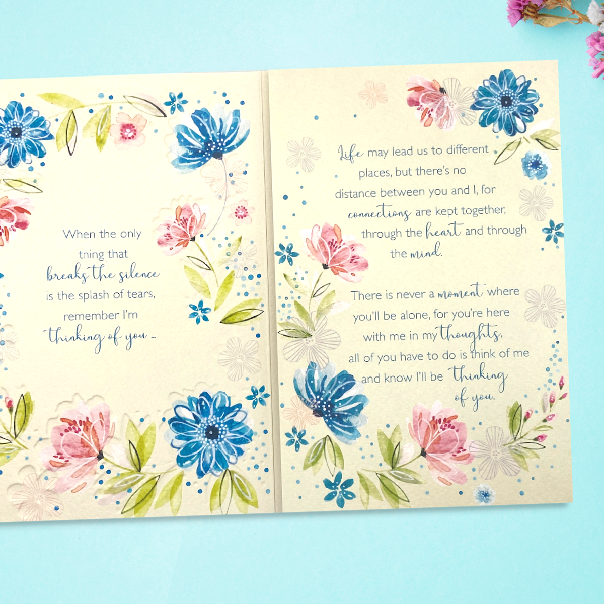 Two inside pages with further flower borders and verse