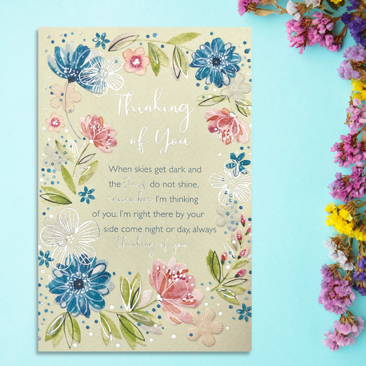 Cream card with blue, pink and green flower border and verse
