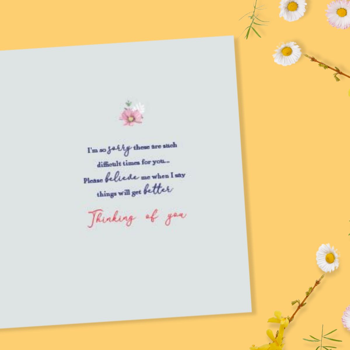 Inside image with grey card, blue text and pink and white floral details