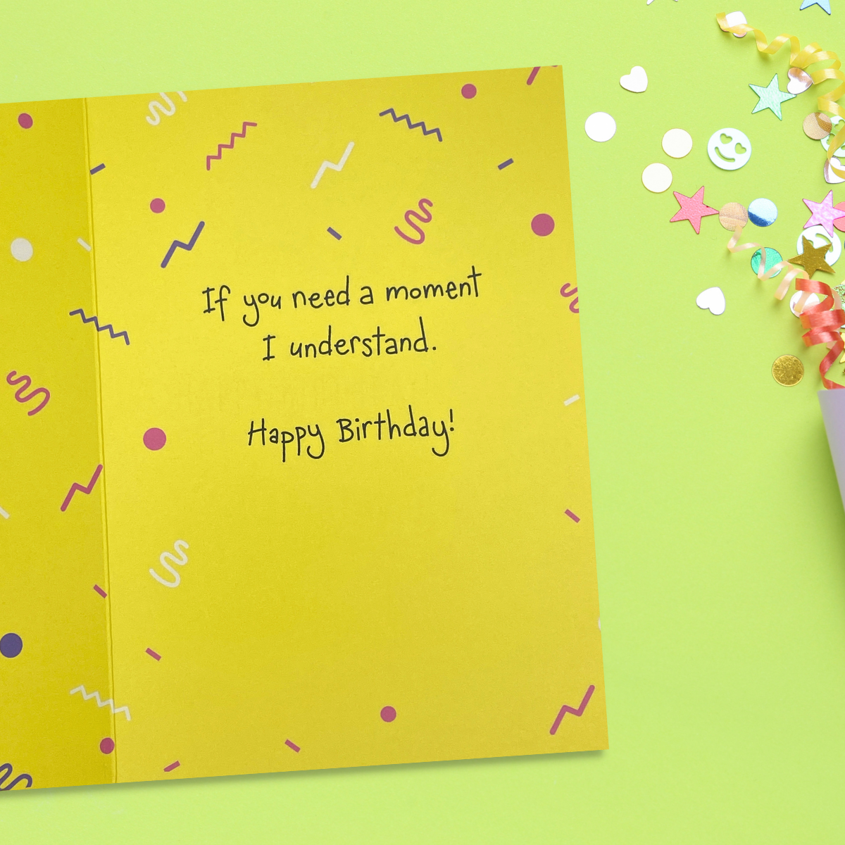 Inside a bright yellow card design with verse and confetti