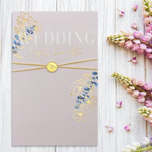 Gold sixpence design card with gold foil flowers and text