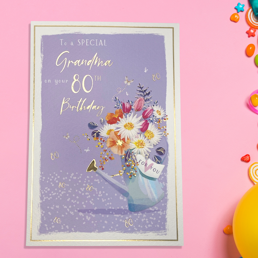 Lilac and white card, with floral watering can and gold 80's