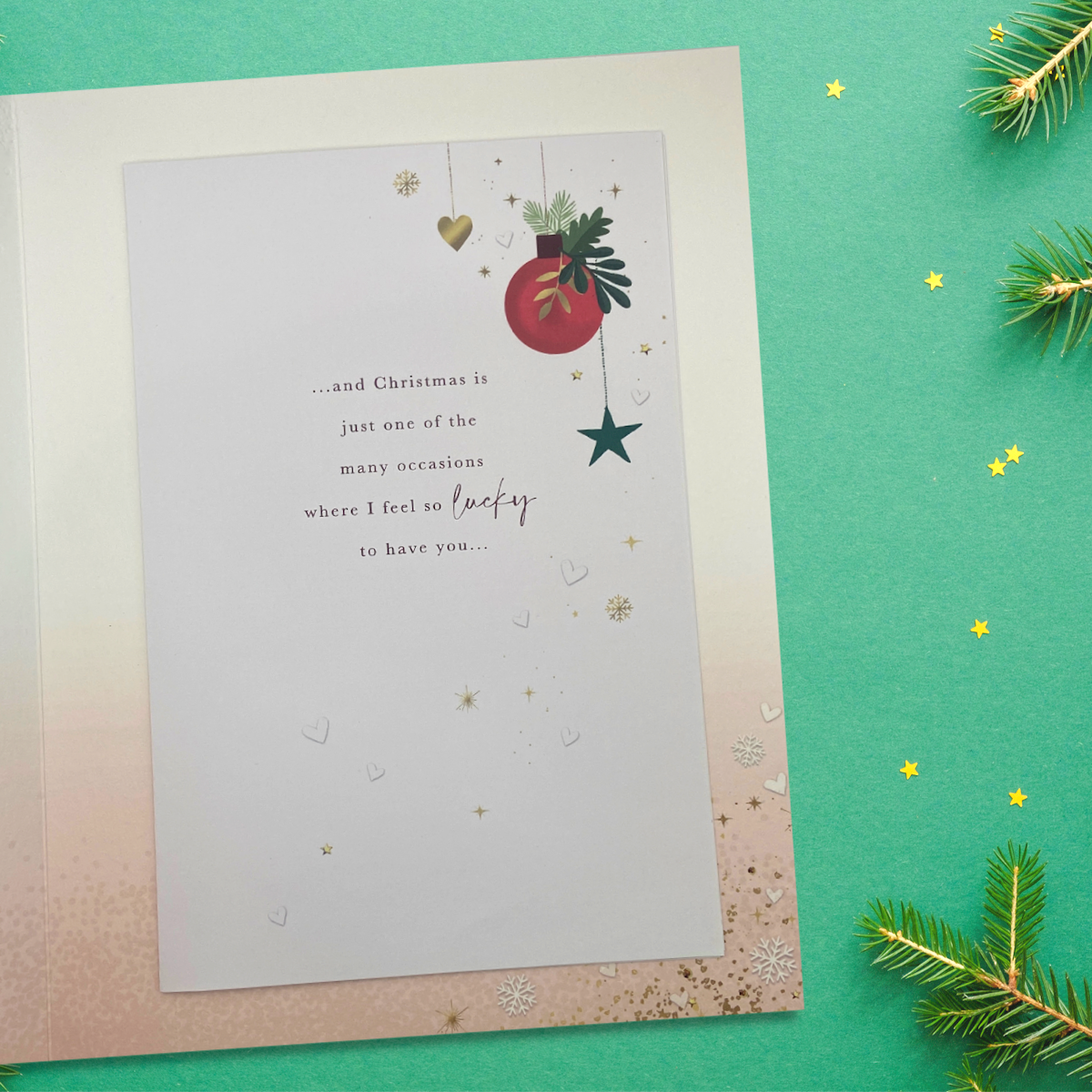 Inside image with full colour print and verse with baubles and hearts