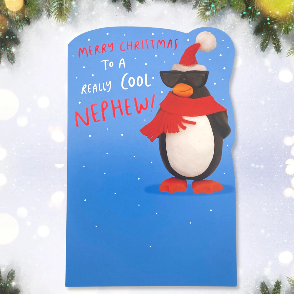 Quirky christmas card with penguin in scarf and sunglasses