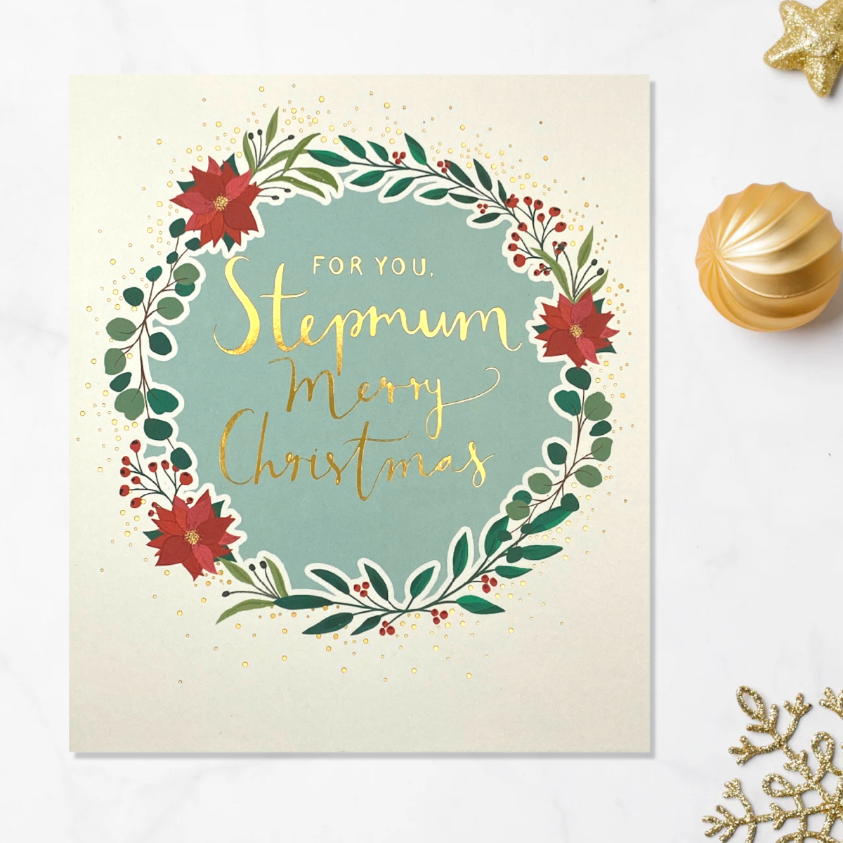 Front image with floral wreath and gold foil text