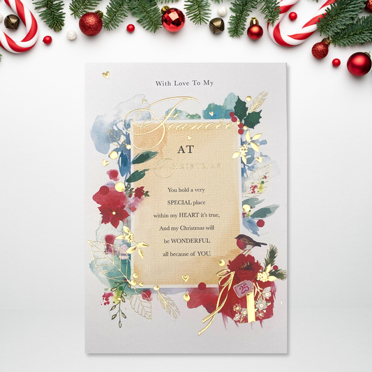 Floral border surrounding verse with gold foil details