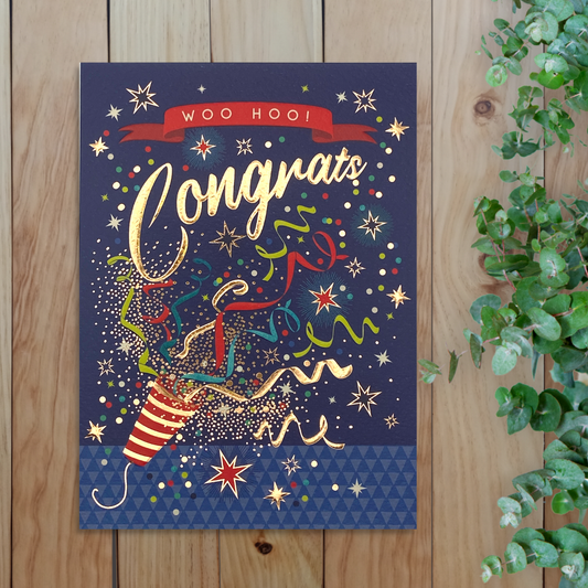 Navy card with streamer design, gold text and details