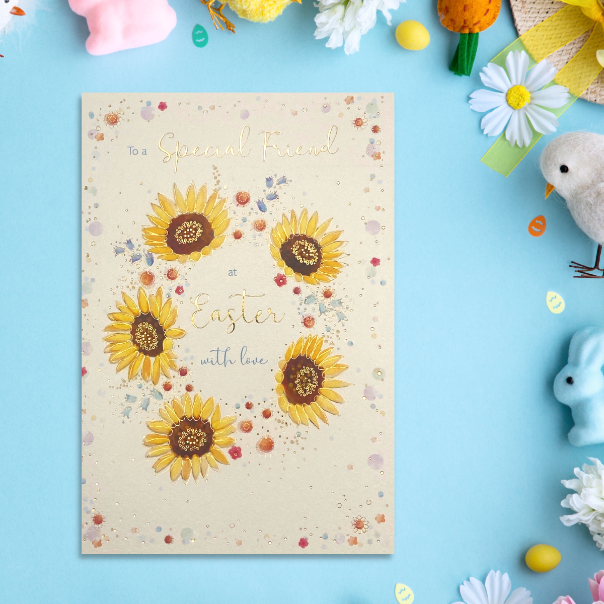 Cream card with sunflowers and gold foil script text