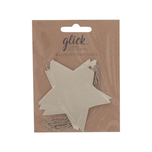 Gold Foil star shaped gift tags on kradt backboard