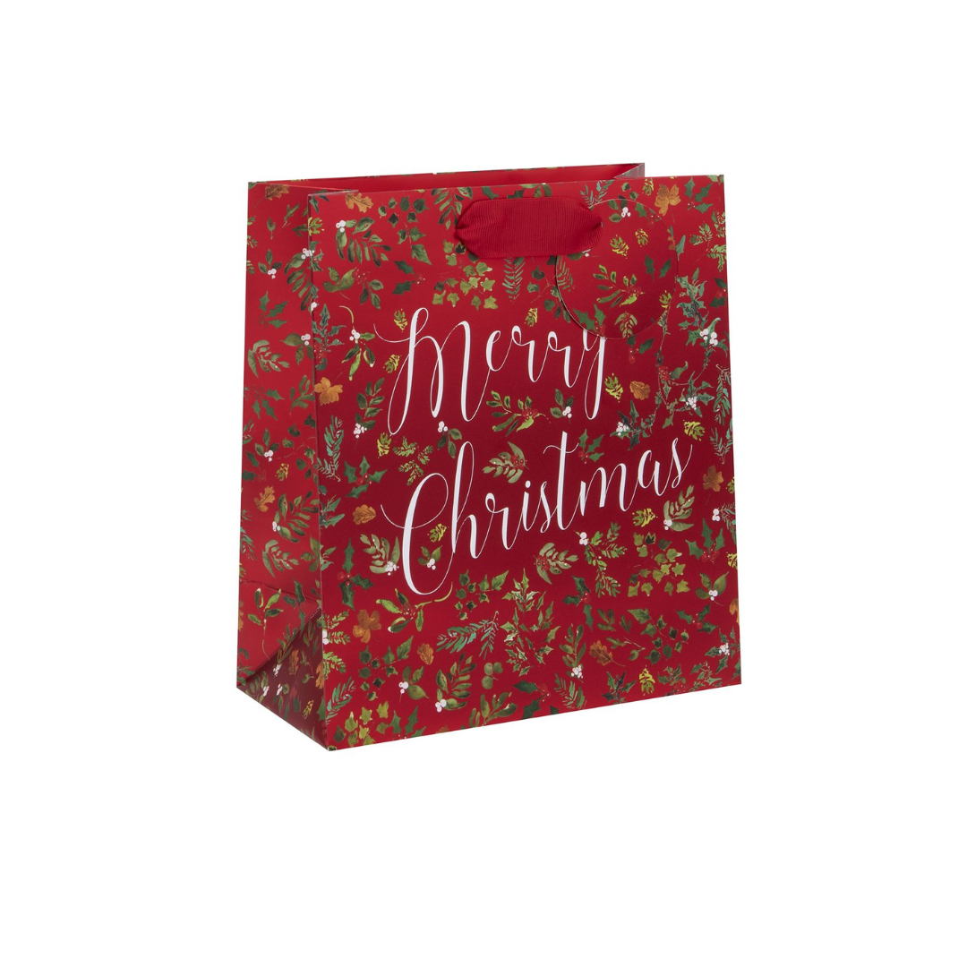 Red gift bag with green holly and foliage with white Merry Christmas script text