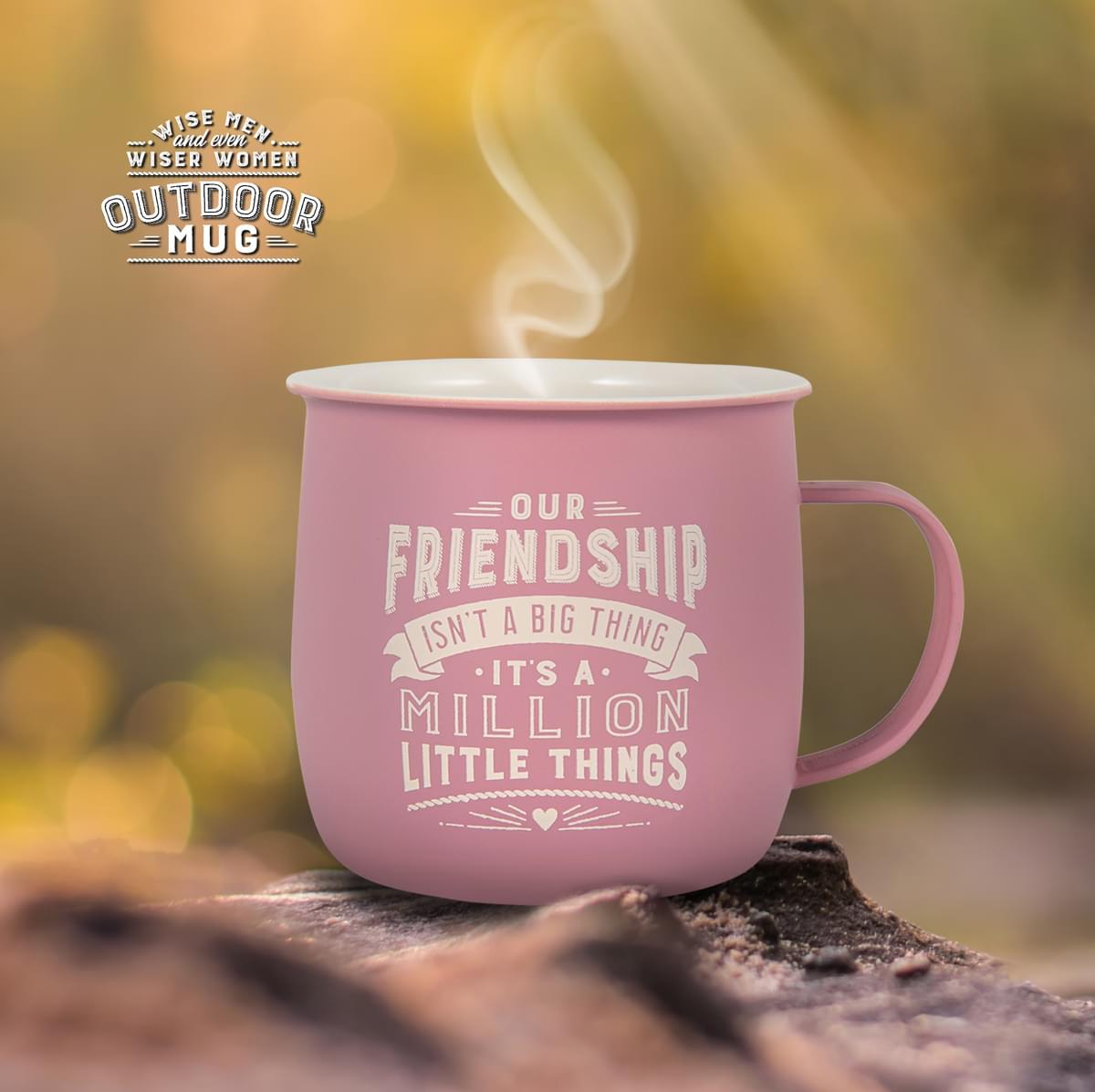 Outdoor Mug shown outdoors with steam rising from it.