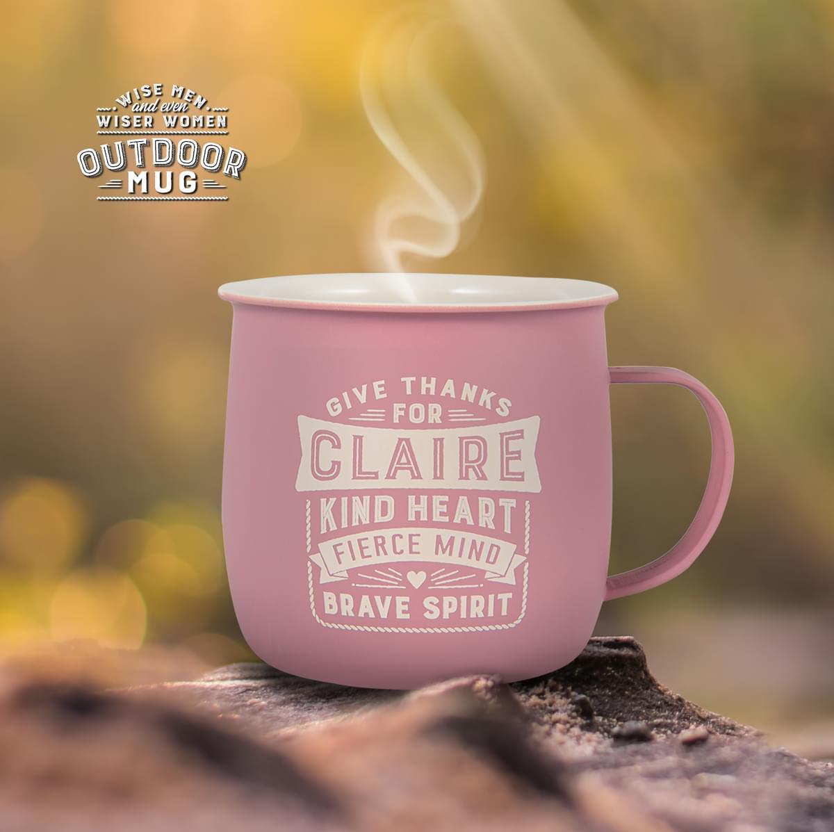 Outdoor Claire Mug shown outdoors with steam rising from it.