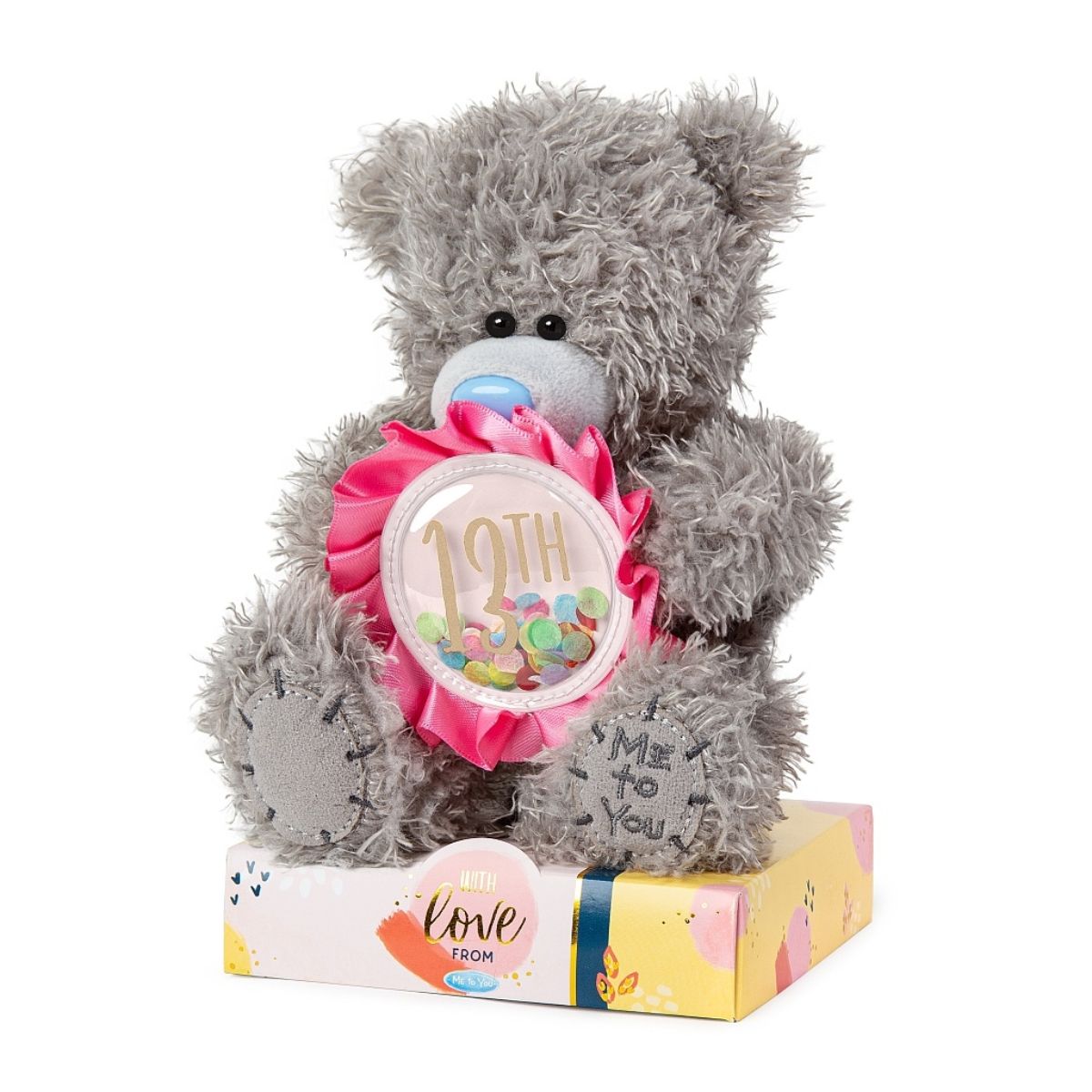 Me To You Bear in grey fur with blue nose sitting on brightly coloured packaging box and holding pink rosette with 13th text.