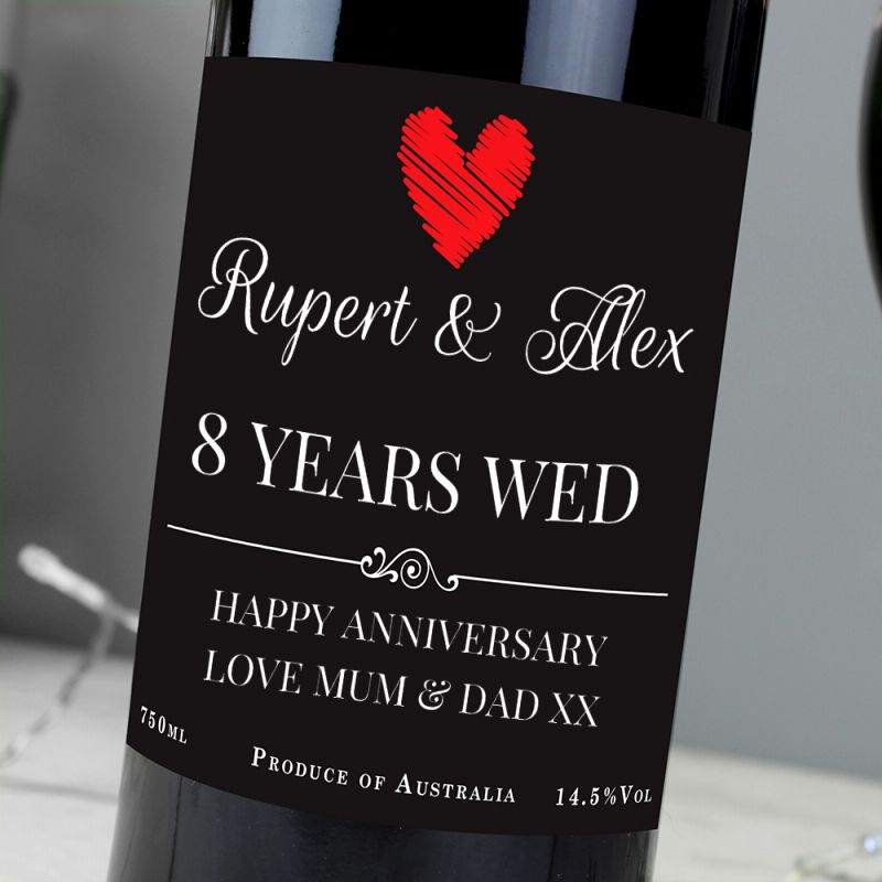 Wine bottle with a personalised label for Rupert & Alex celebrating 8 years married.