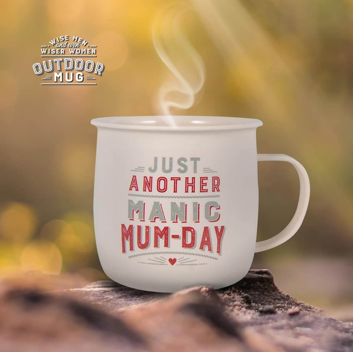 Outdoor mug shown outdoors with steam rising from it.