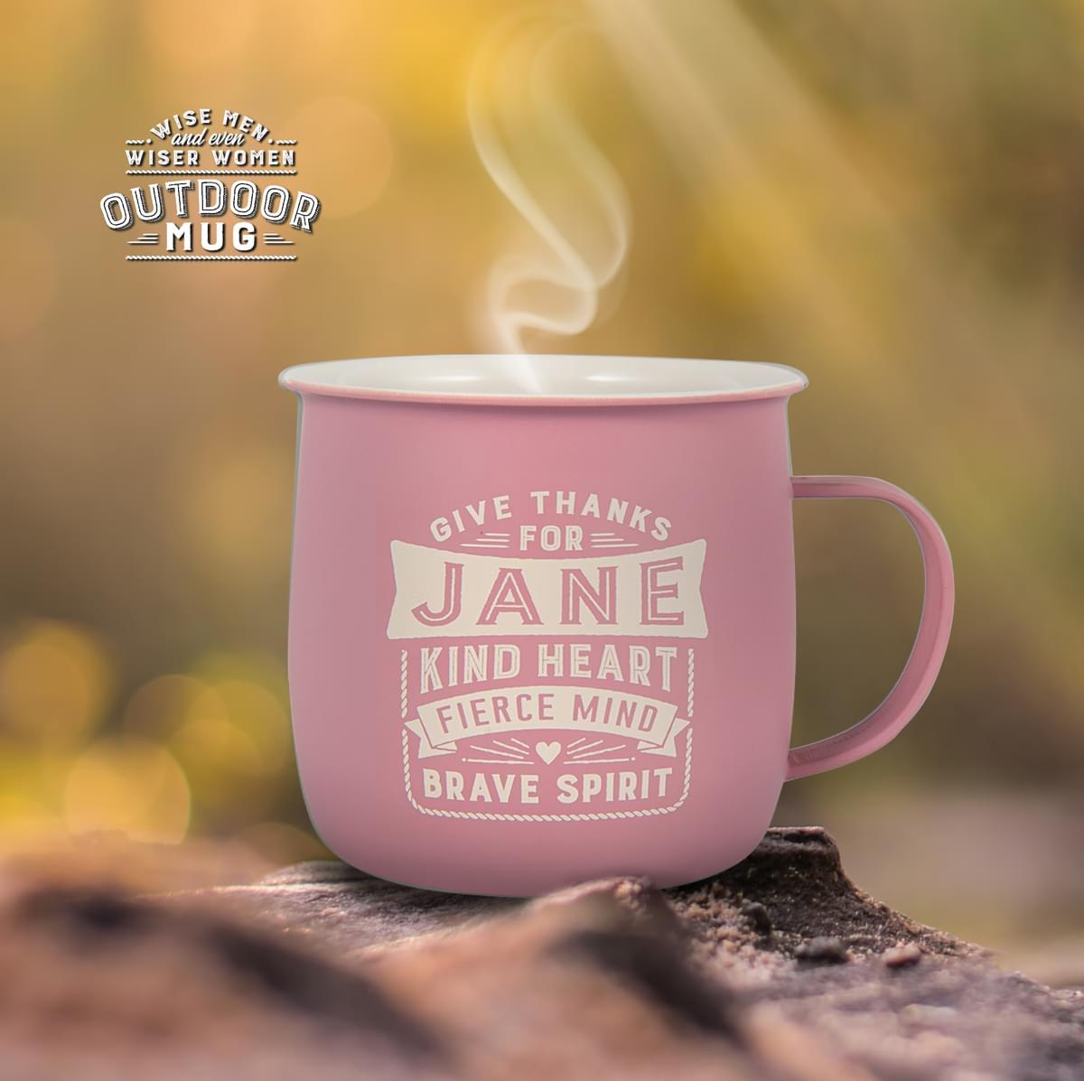 Outdoor Jane Mug shown outdoors with steam rising from it.