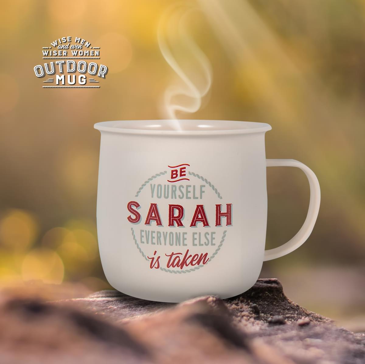 Outdoor Sarah Mug shown outdoors with steam rising from it.