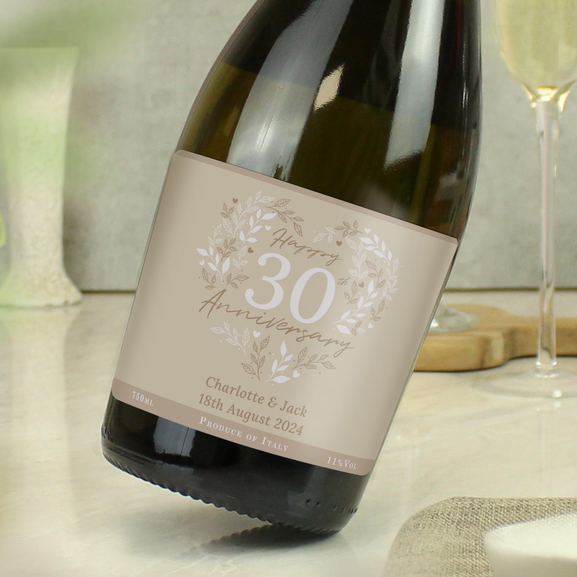 Wine bottle with a personalised label for a 30th anniversary on a table.