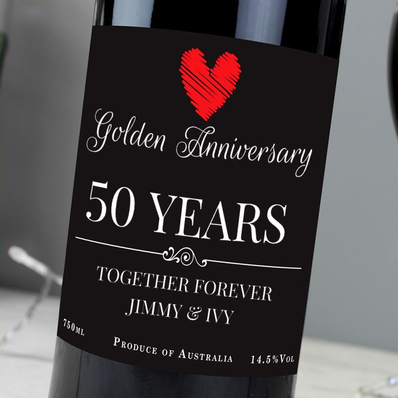 Wine bottle with a 'Golden Anniversary 50 Years Together Forever' label.