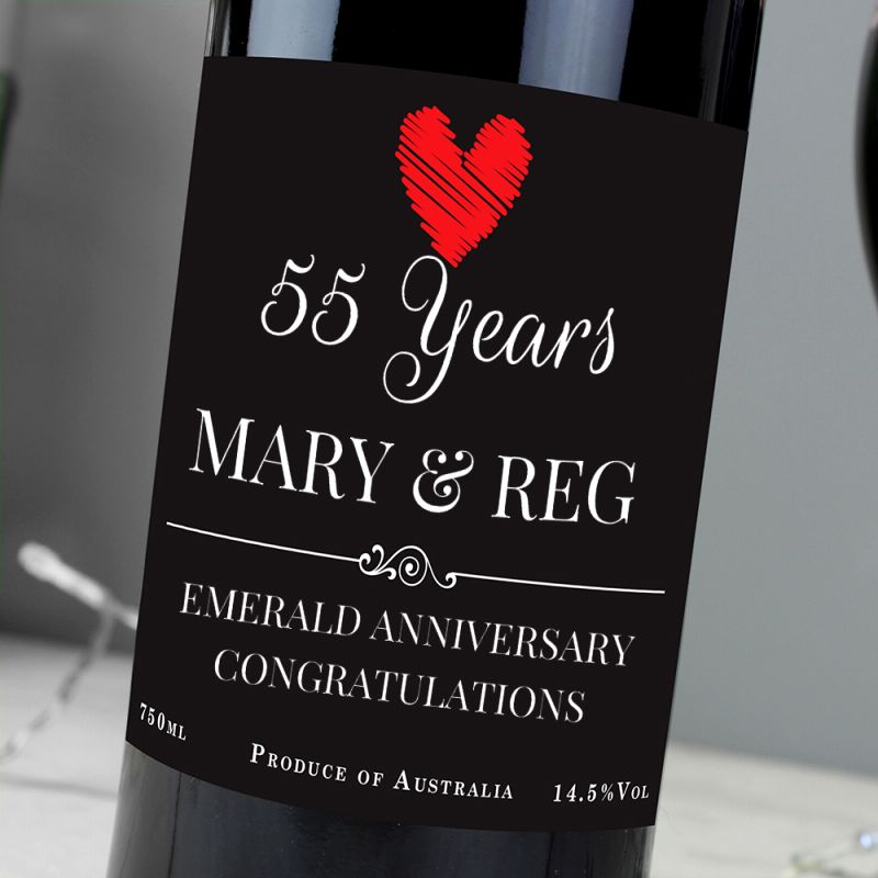 Wine bottle label celebrating 55 years with 'Mary & Reg' and an emerald anniversary.