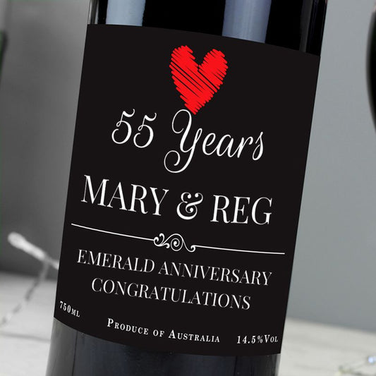 Wine bottle label celebrating 55 years with 'Mary & Reg' and an emerald anniversary.