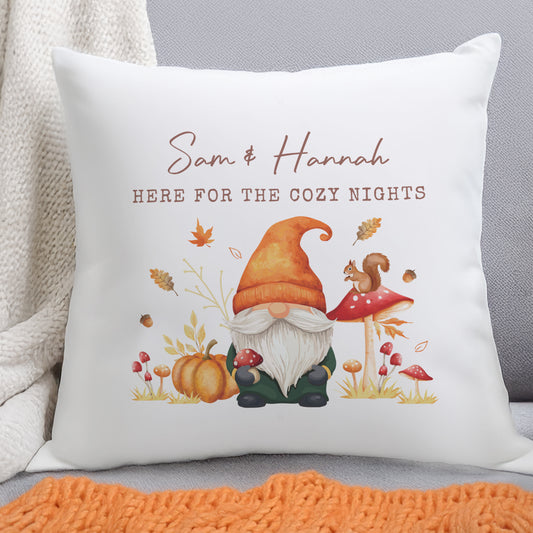 Decorative personalised cushion with a gnome, pumpkin, and mushroom design, featuring text 'Sam & Hannah HERE FOR THE COZY NIGHTS'.