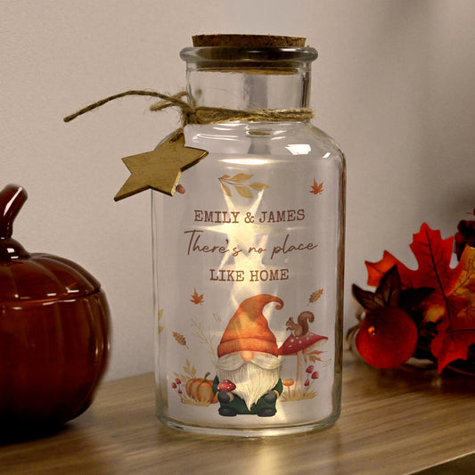 Decorative autumn themed glass jar with a gnome design and personalised text.