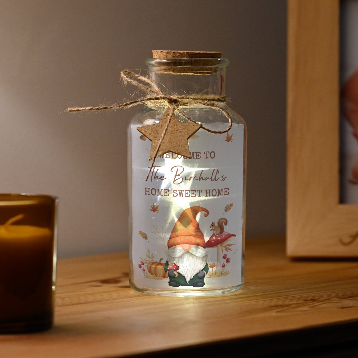 Decorative autumn themed personalised glass jar with LED light, gnome illustration, and 'Home Sweet Home' text.