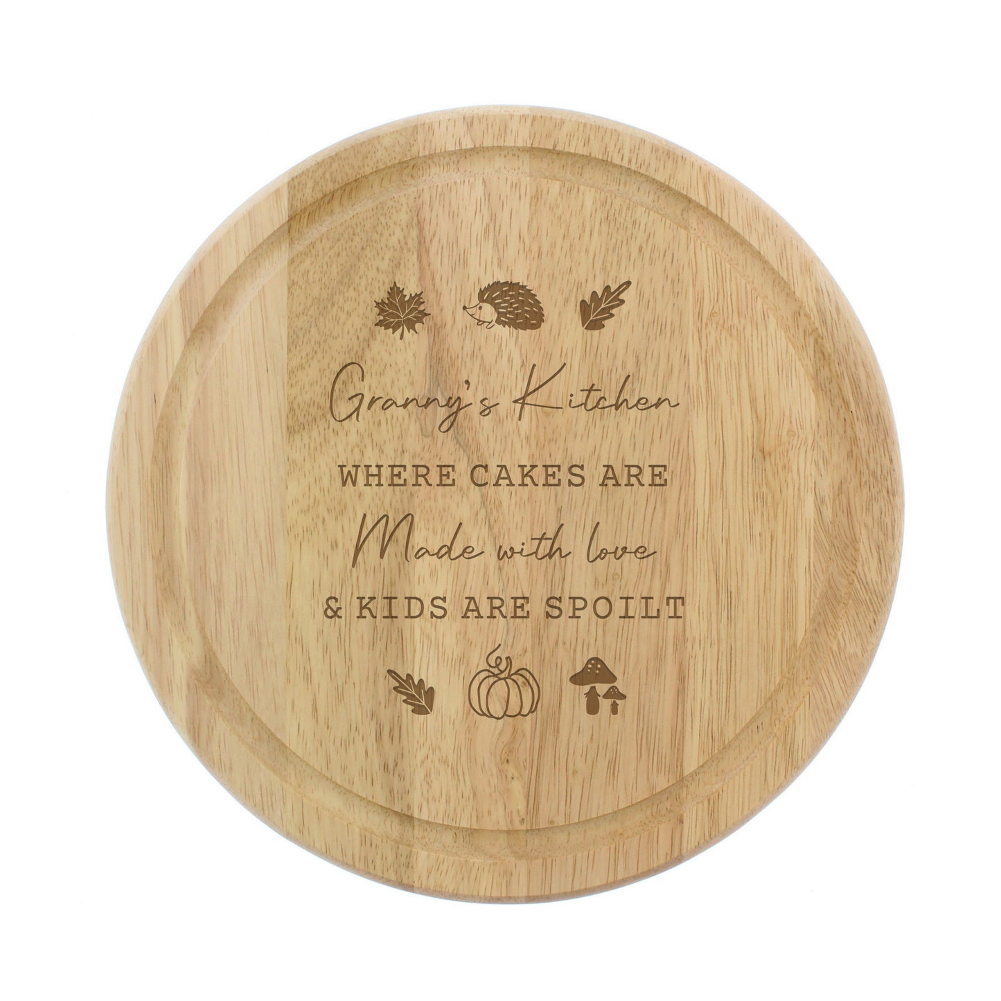 Wooden round cutting board with engraved text and illustrations on a white background