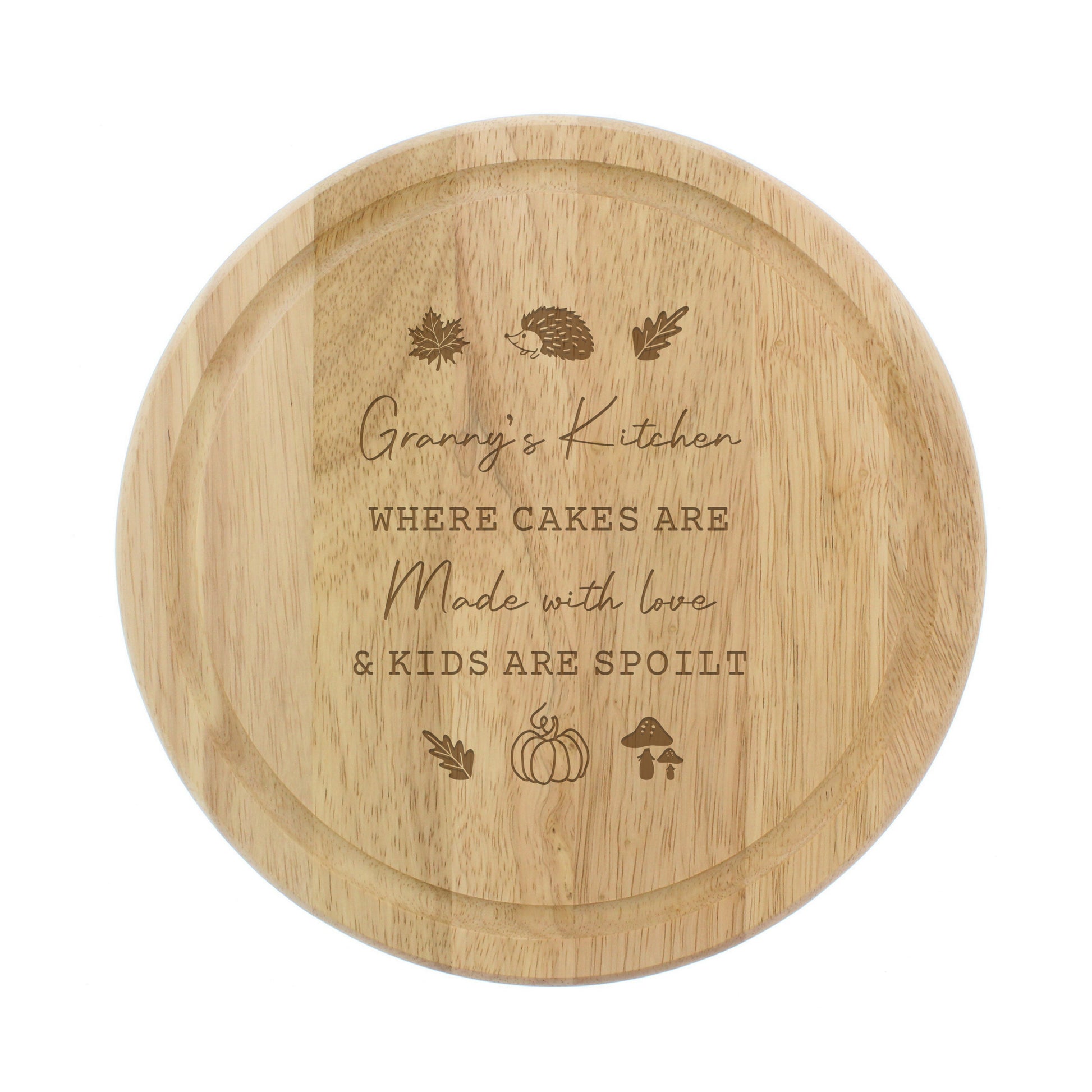 Wooden round cutting board with engraved text and illustrations on a white background
