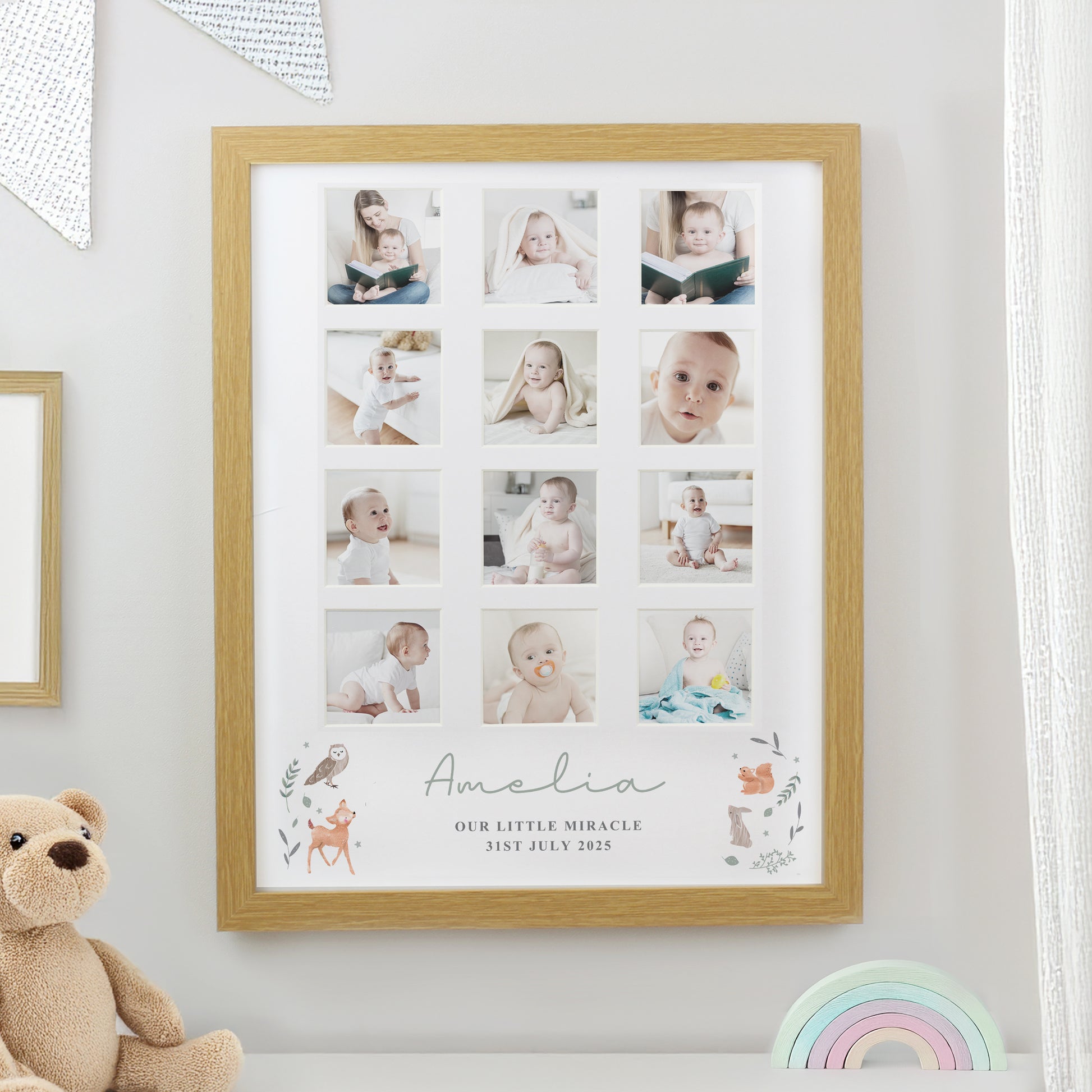 Wooden photo frame with baby pictures and 'Amelia Our Little Miracle 31st July 2025' text on a white wall with a teddy bear and rainbow toy.