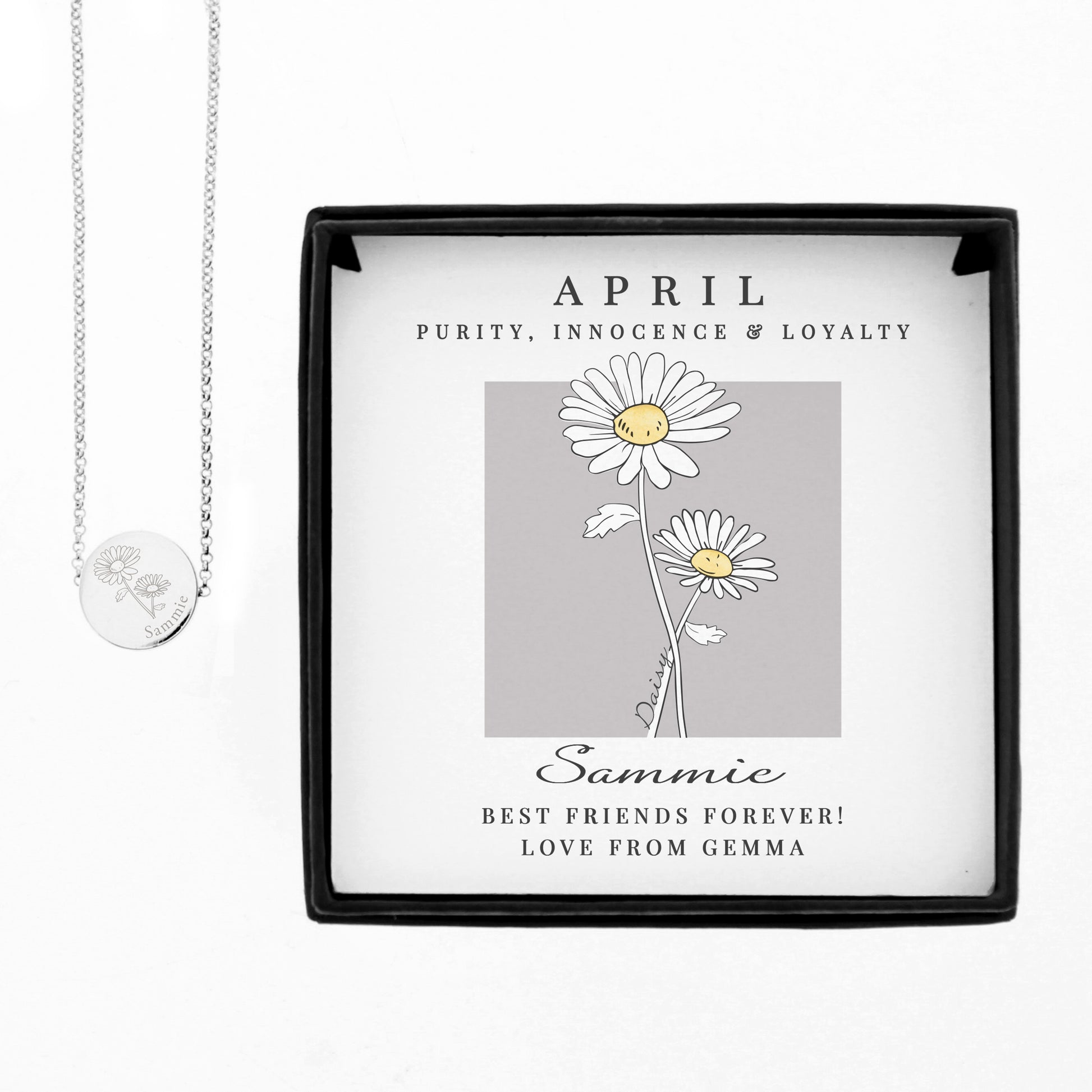 Necklace in a decorative box with floral design and text